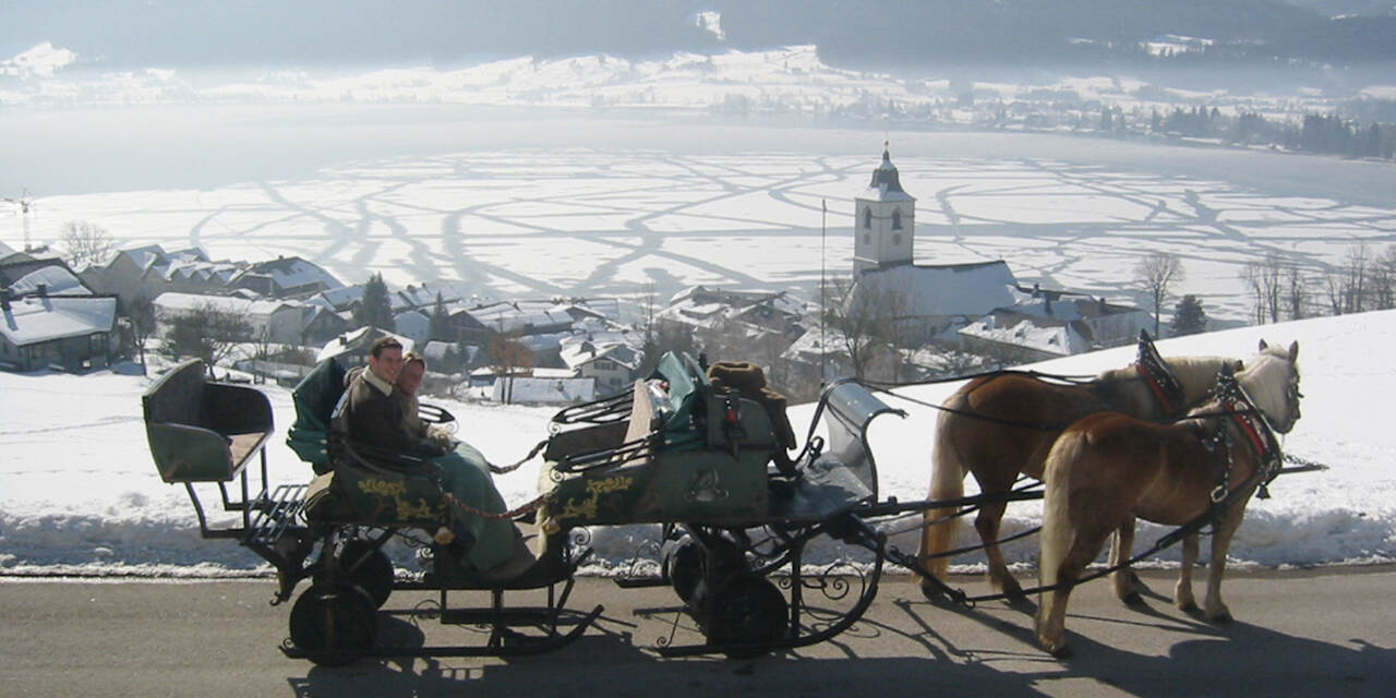 [Translate to German:] Private horse drawn sleigh ride in St.Wolfgang © Familie Strobl