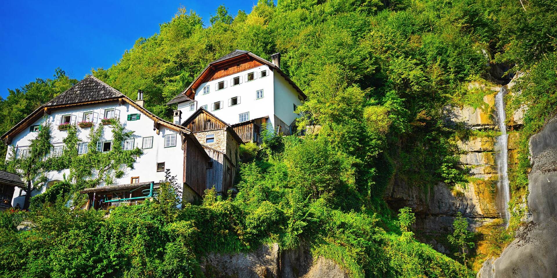 Hallstatt - old houses in the village on the hillside - Hallstatt Tour by Salzburg Panorama Tours