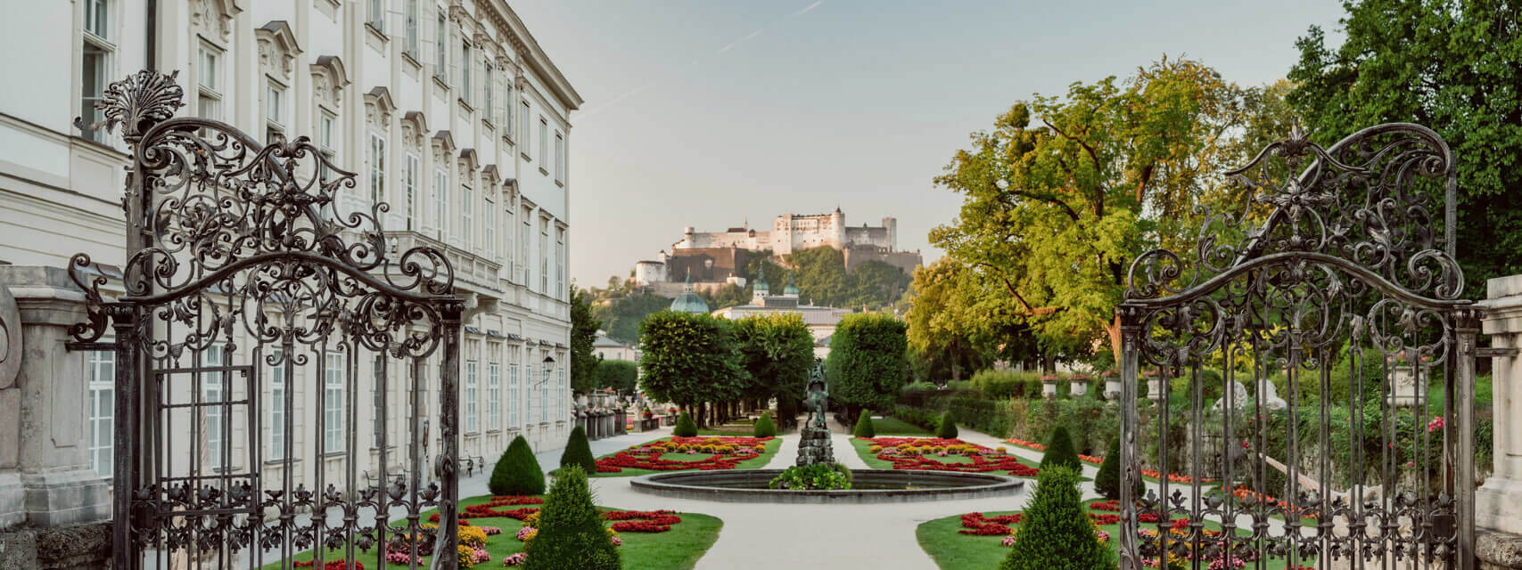 Hohensalzburg Fortress towers over Salzburg's Mirabell Gardens in the background © Tourismus Salzburg GmbH / Patrick Langwallner