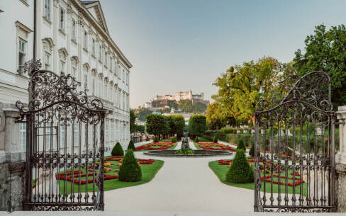 Hohensalzburg Fortress towers over Salzburg's Mirabell Gardens in the background © Tourismus Salzburg GmbH / Patrick Langwallner