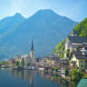 Hallstatt - View of the town with the church, next to it Lake Hallstatt and the mountains - Hallstatt Tour with Salzburg Panorama Tours