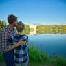 Couple hugging in front of Leopoldskron pond near Leopoldskron Palace on the Sound of Music Tour by Salzburg Panorama Tours